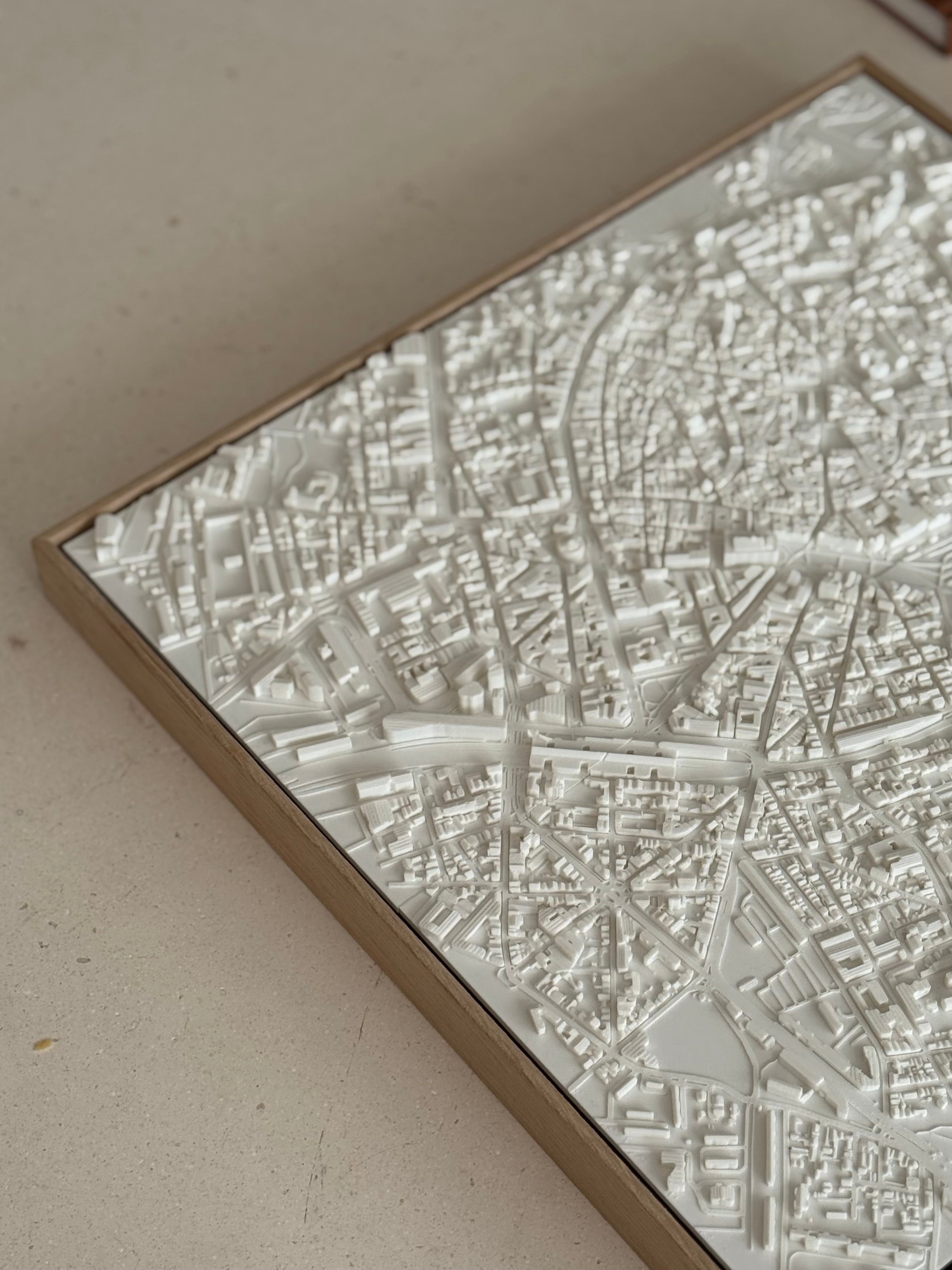 Detailed 3D city map wall art in a wooden frame, modern urban decor