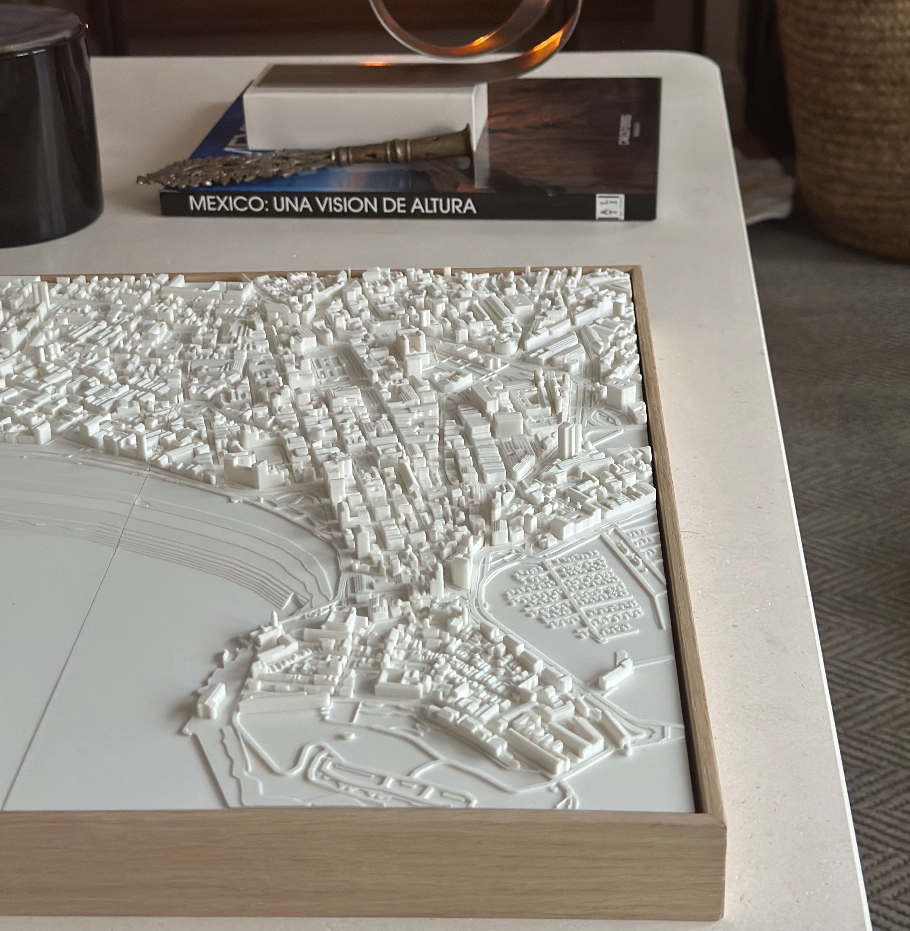 3D city map wall art in white with wooden frame on a modern table, home decor accent