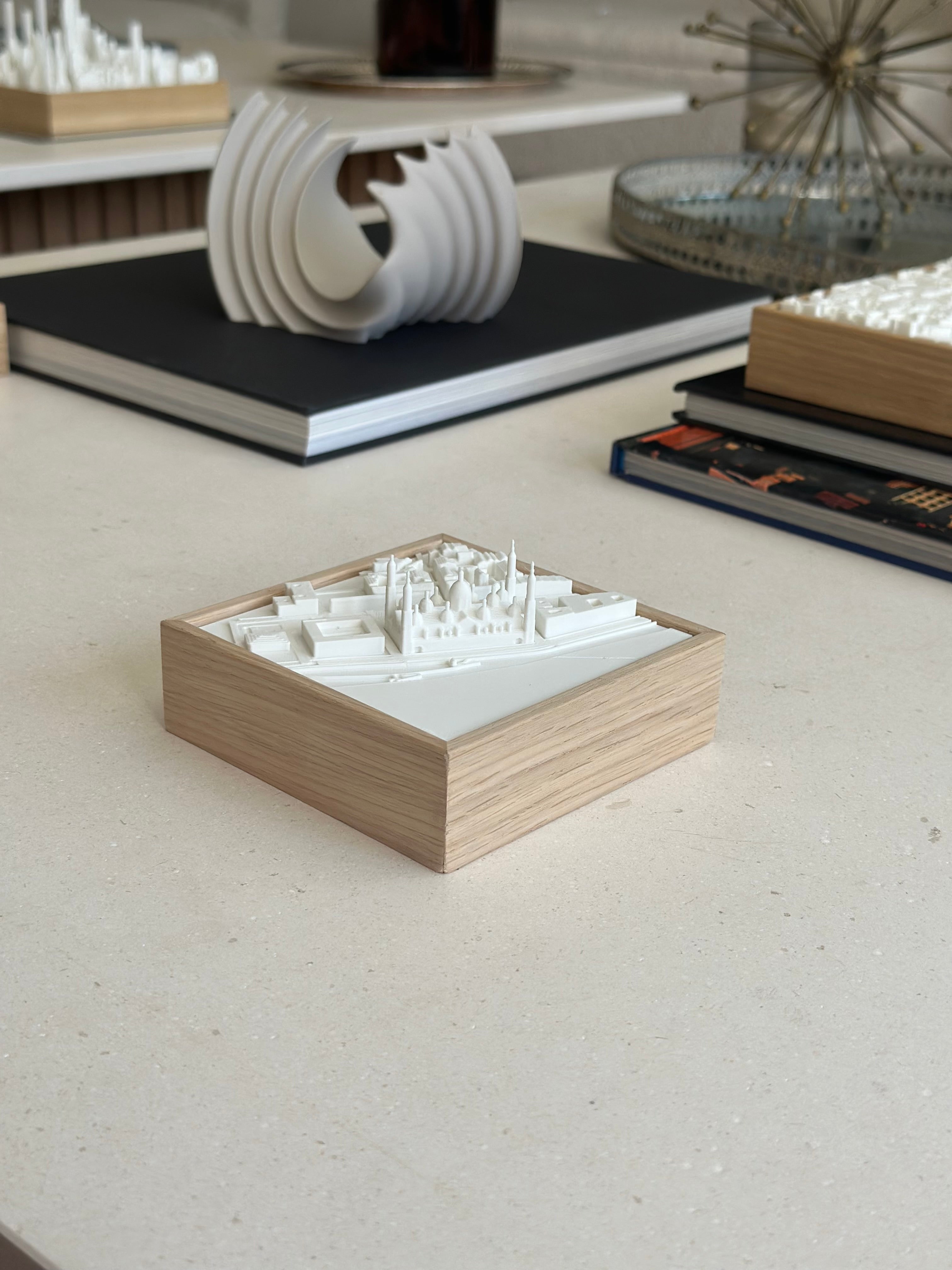 3D city map wall art in white with wooden frame on modern decor table