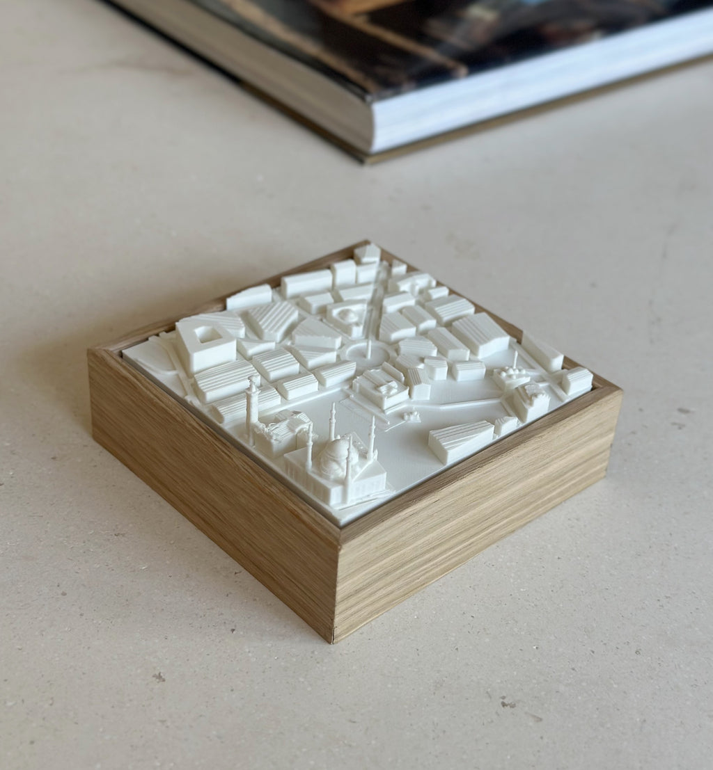 3D city map wall art with white buildings on wooden base, modern home decor