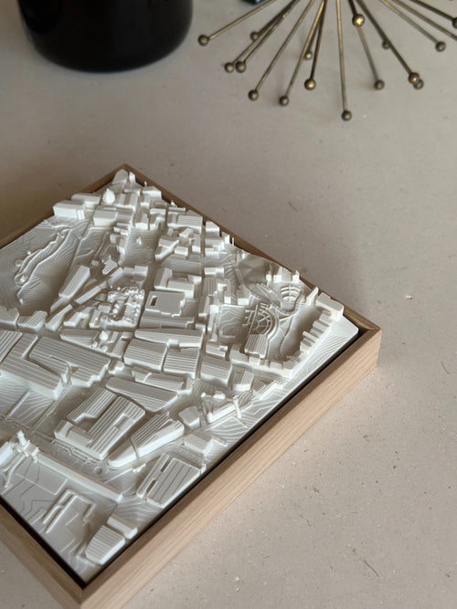 Decorative 3D city map wall art in a wooden frame, modern urban decor piece