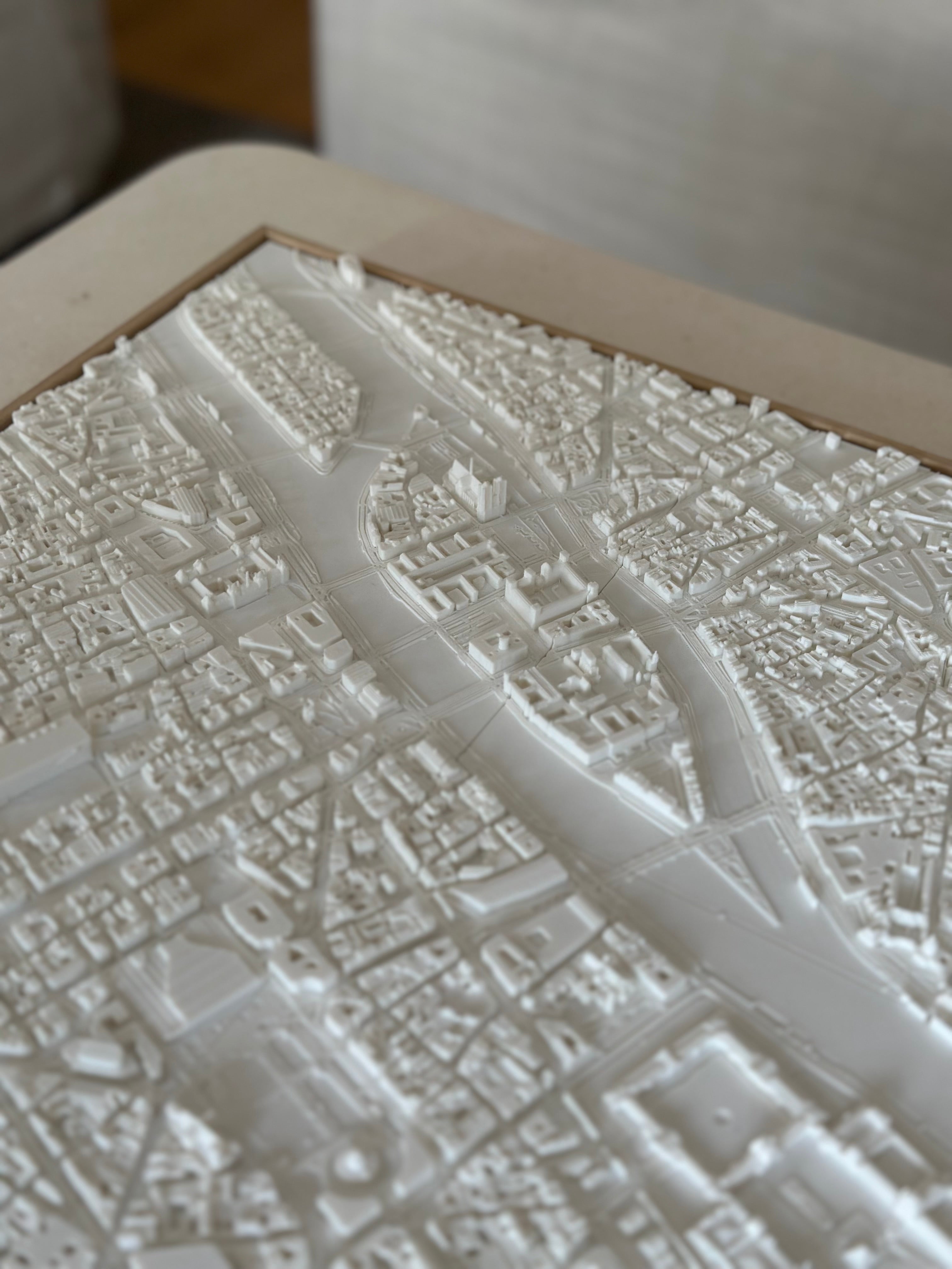 3D city map art in white, detailed cityscape relief wall decor for modern interiors