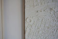 Detail of a white 3D city map wall art featuring urban streets and landmarks