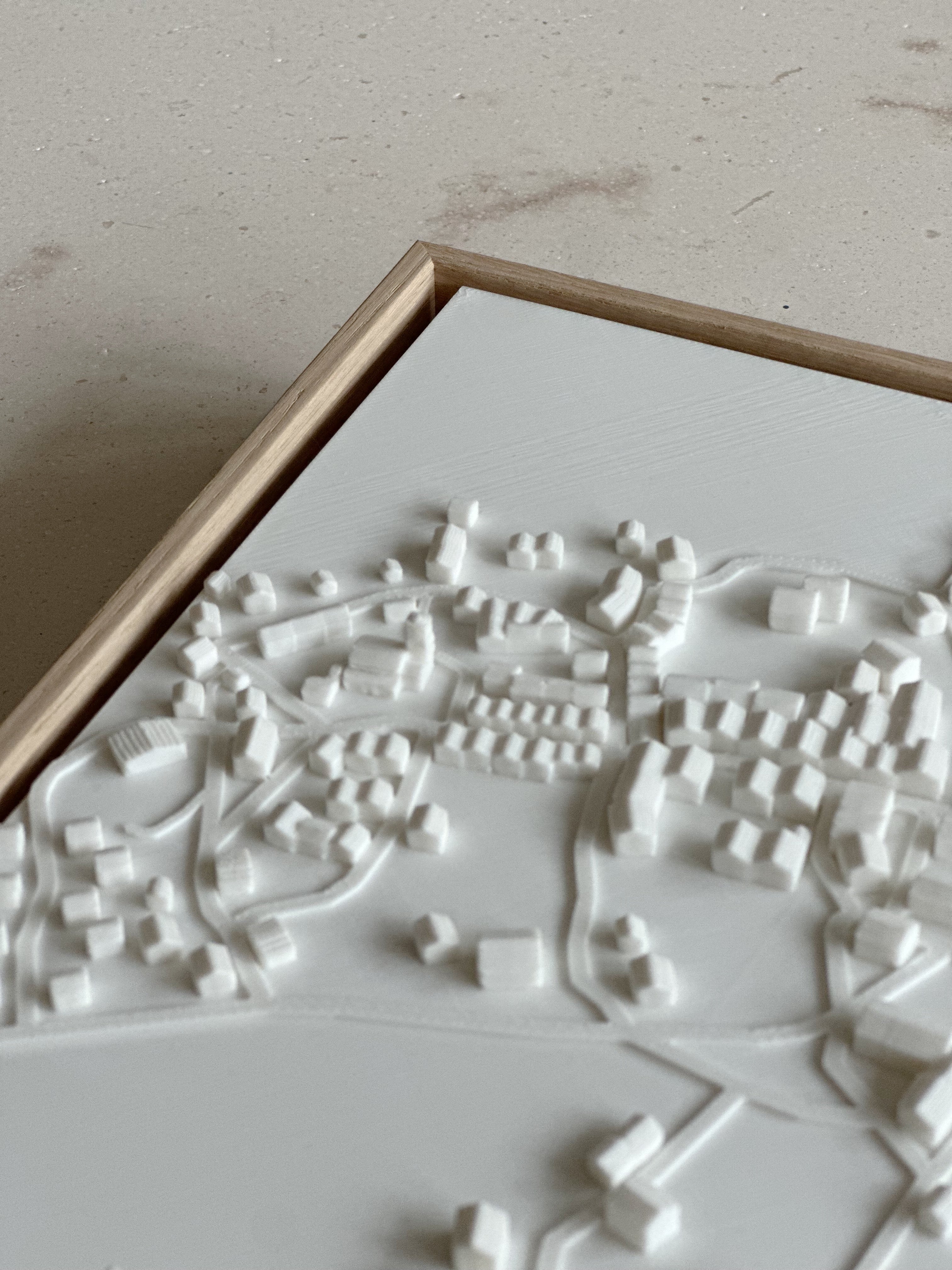 3D city map wall art in a wooden frame, minimalist home decor detail