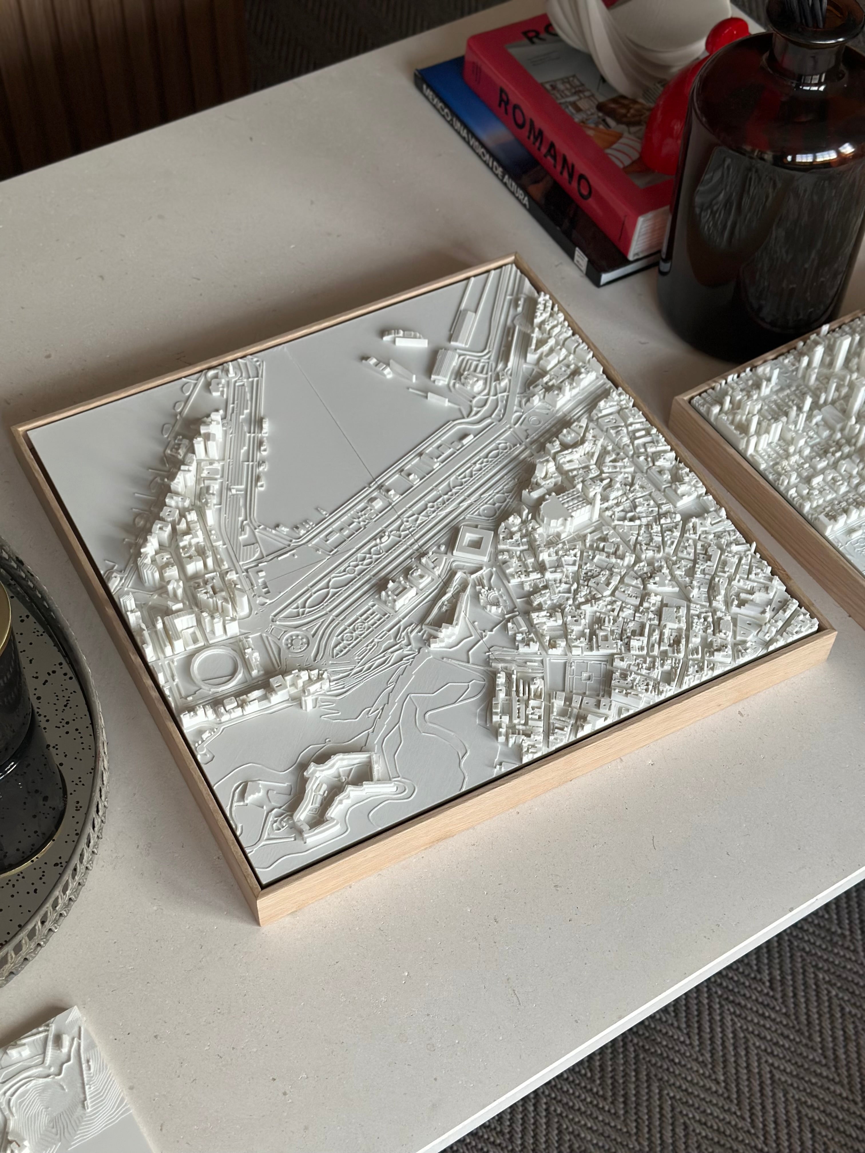 3D city map wall art in a wooden frame on a modern table, decorative and detailed