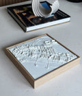 3D city map wall art in wooden frame on a modern table, decorative urban design