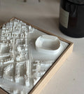 3D city map wall art featuring detailed buildings and a prominent stadium in a wooden frame