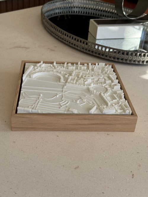 3D city map wall art in a wooden frame on a beige table, modern home decor
