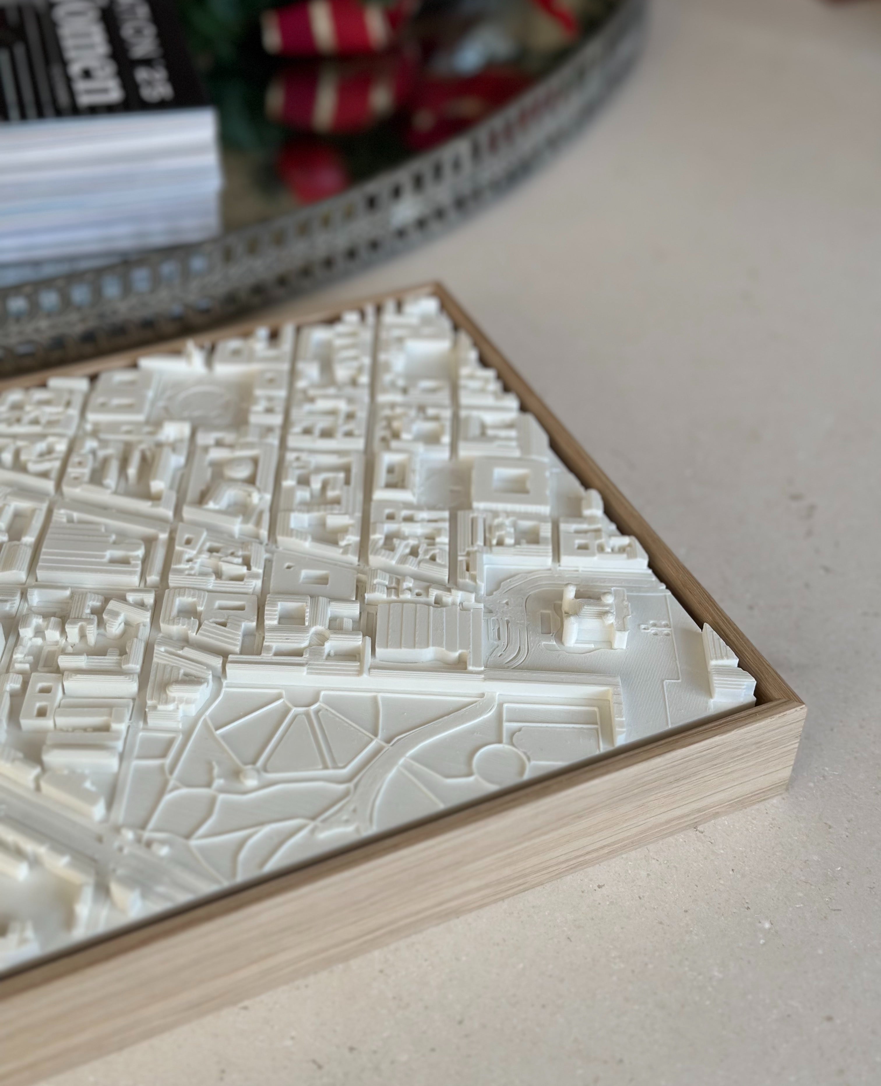 3D city map wall art in a wooden frame, minimalist urban decor for travelers