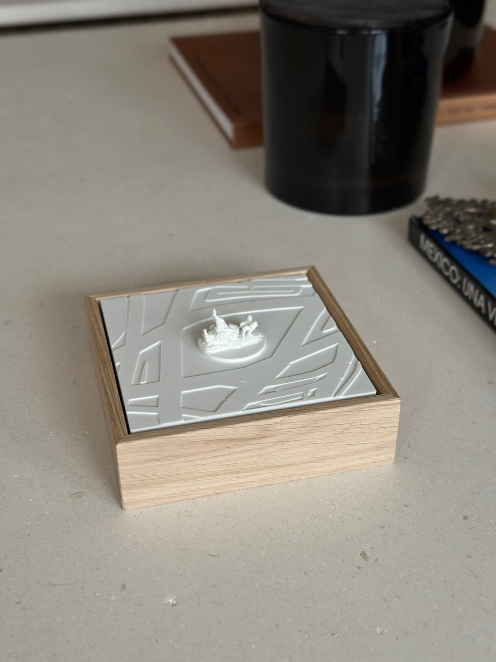 3D city map art in a wooden frame on a modern tabletop, minimalist home decor