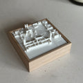 3D city map artwork in a wooden frame, modern tabletop urban decor