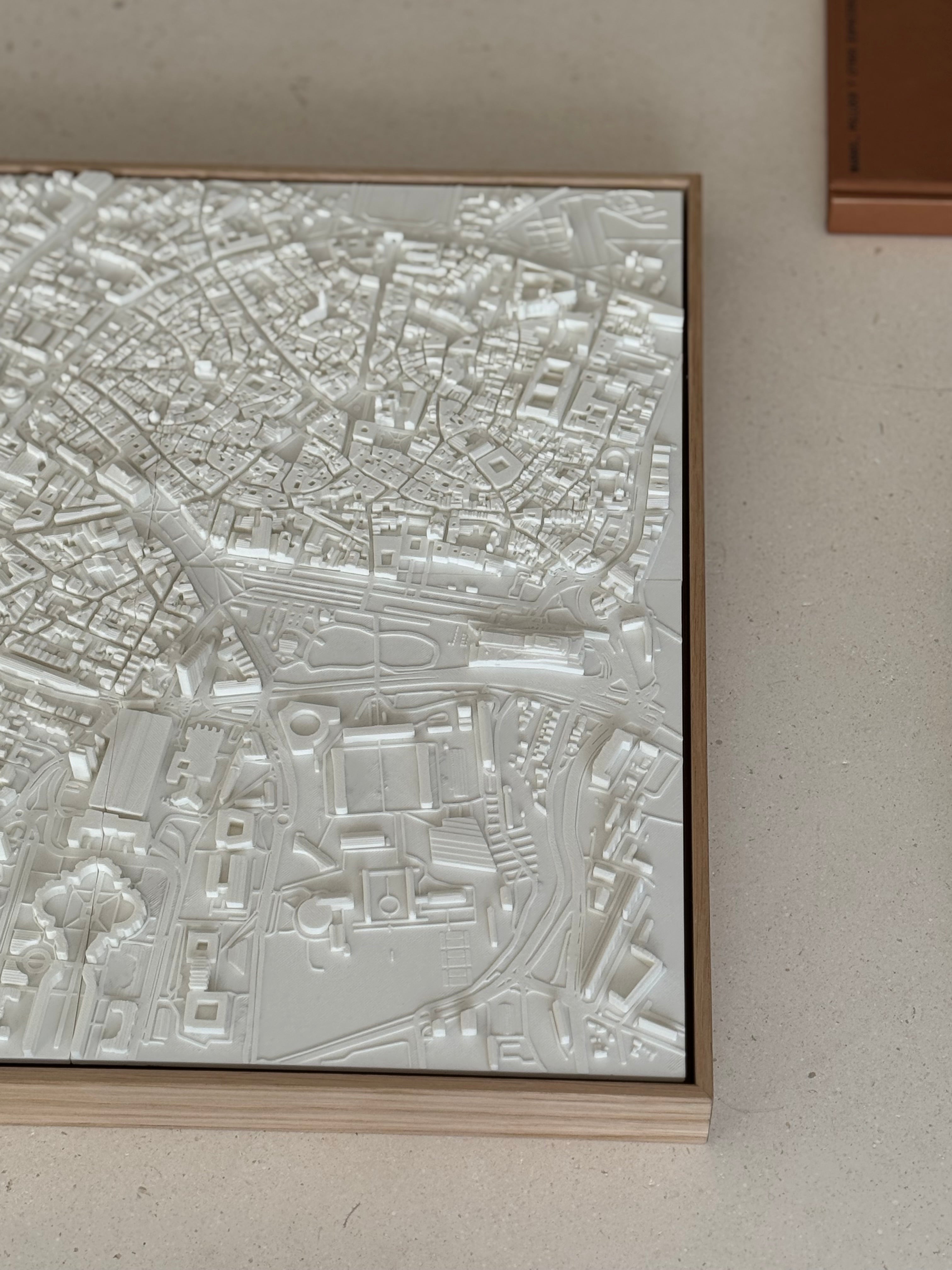 3D city map wall art in white relief with wooden frame, modern decor for travelers