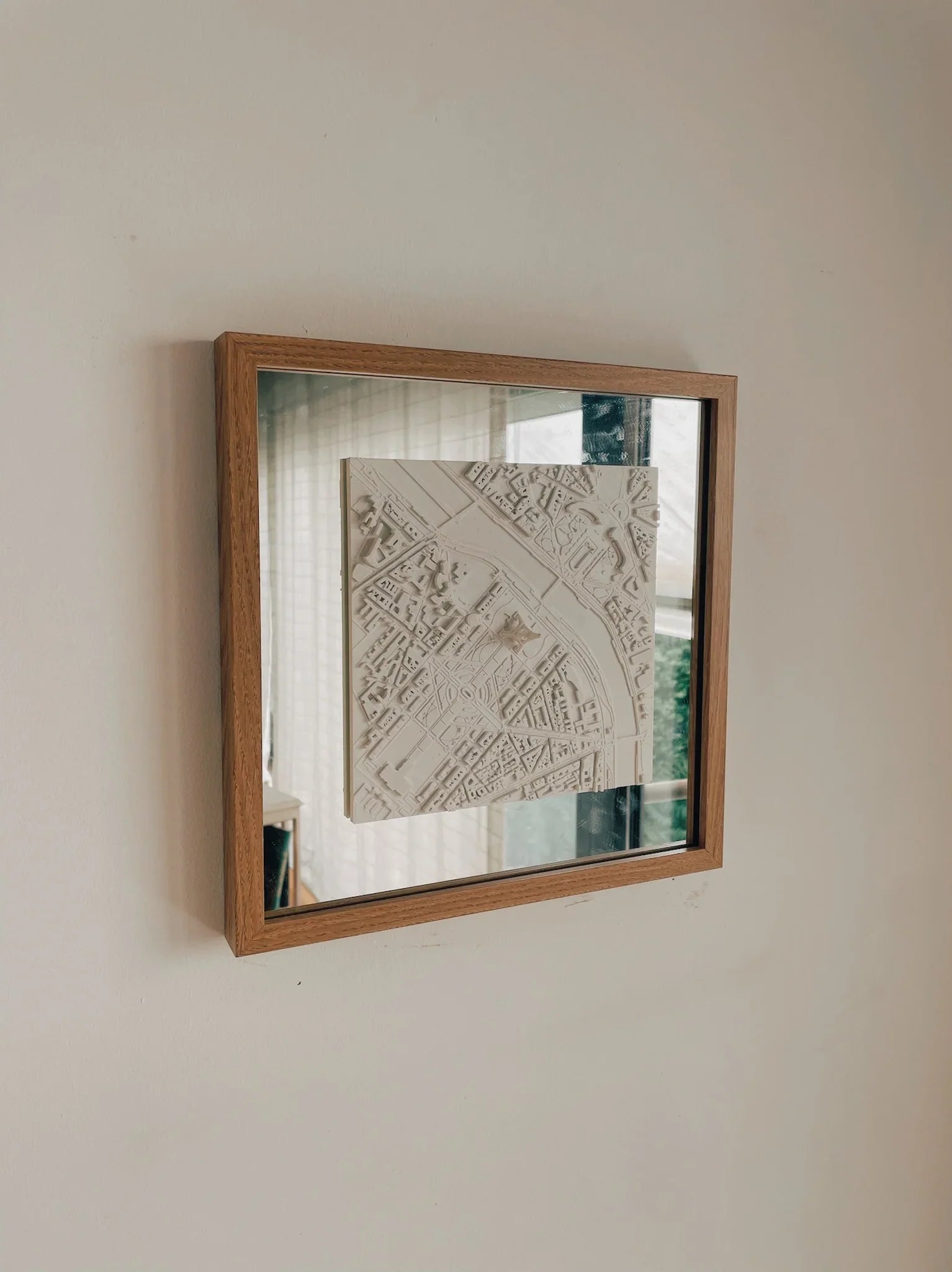 Framed 3D city map wall art with minimalist white relief, modern home decor