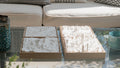 3D city map art and topographic models in wooden frames on a coffee table