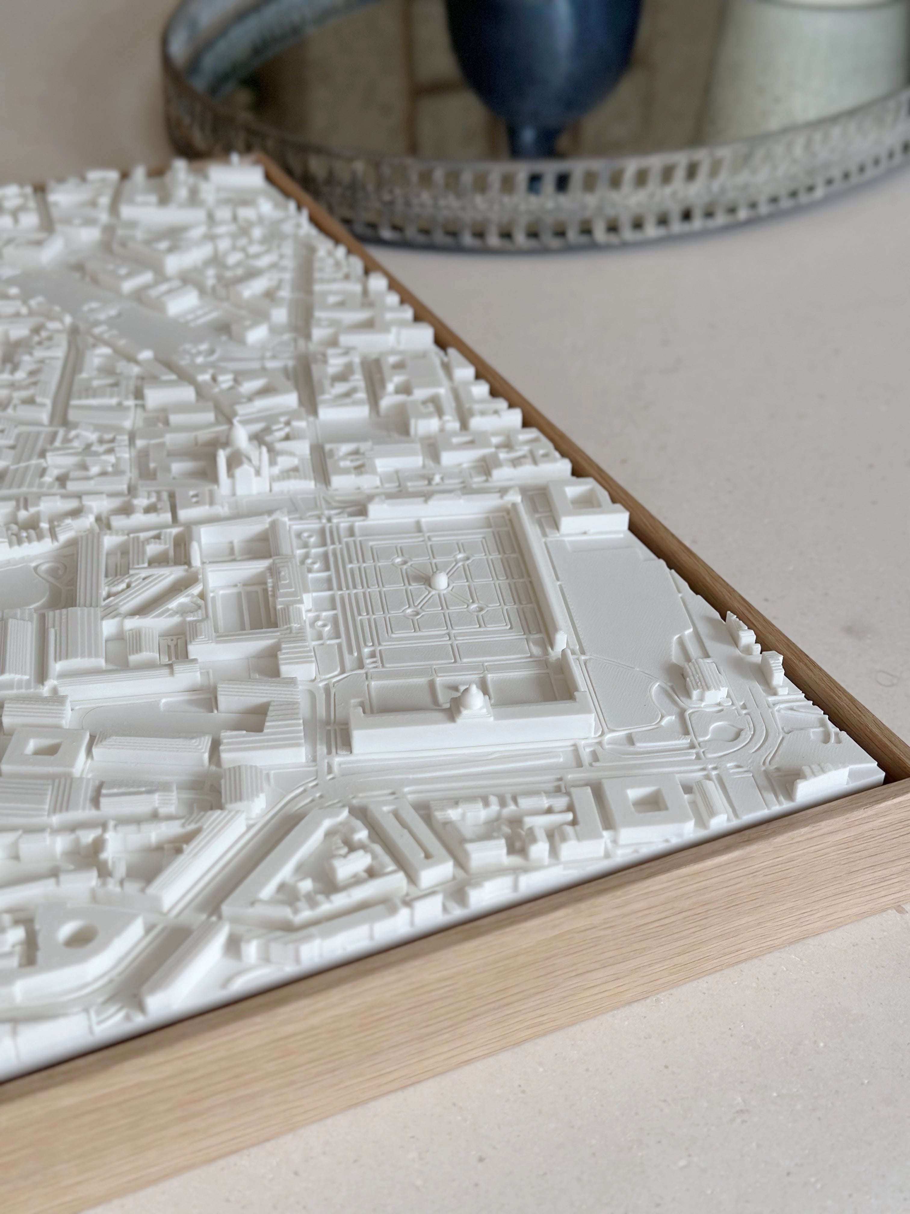 3D city map wall art in white frame on modern table, decorative home decor for travelers