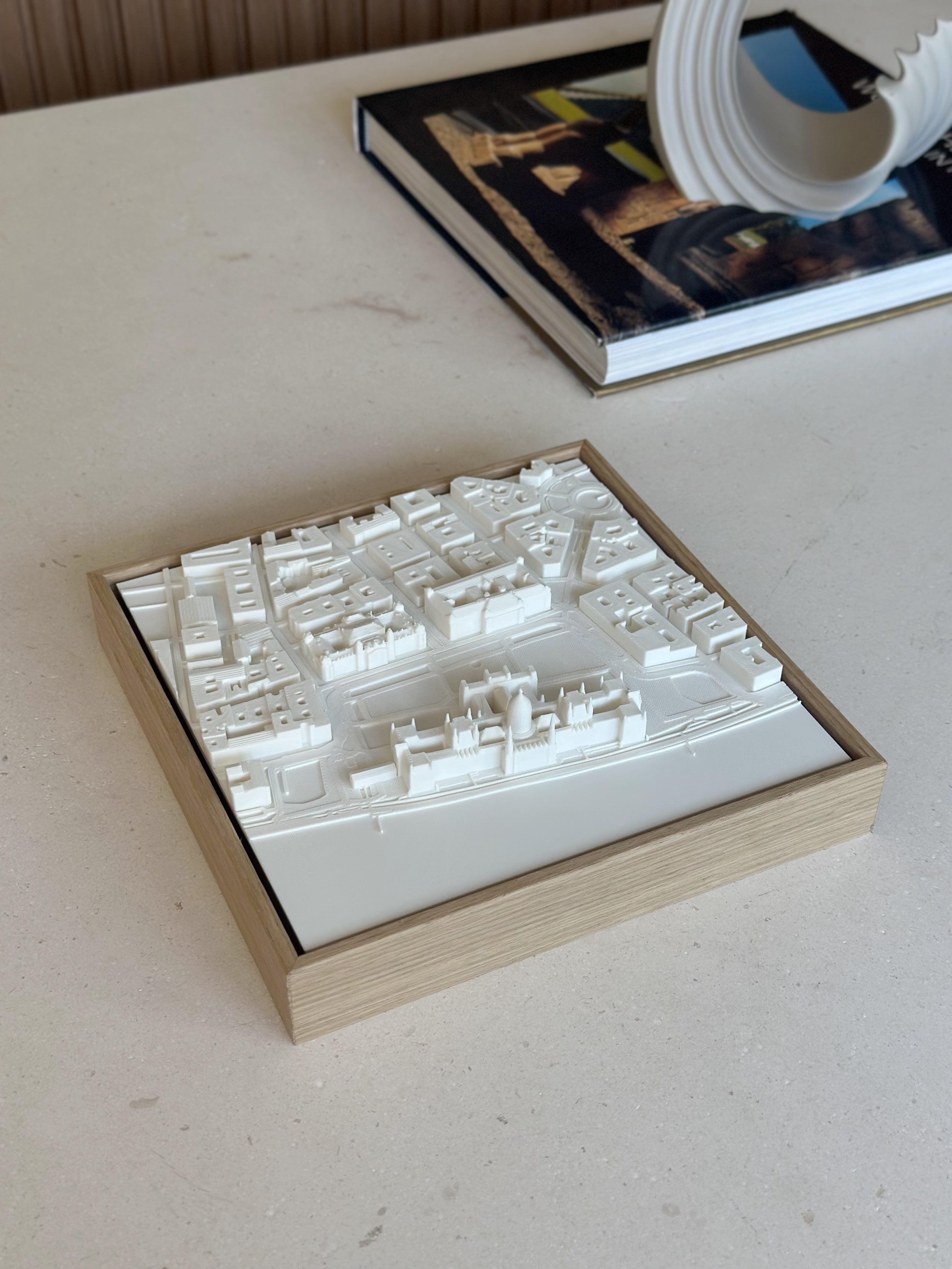 3D city map wall art with wooden frame on a modern table, home decor accent