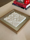 3D city map wall art in a wooden frame on a table, modern home decor accent