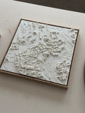 3D city map art in a wooden frame, white relief wall decor for travelers
