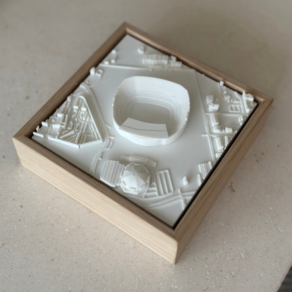 3D city map wall art in wood frame, featuring stadium and urban streets, home decor gift