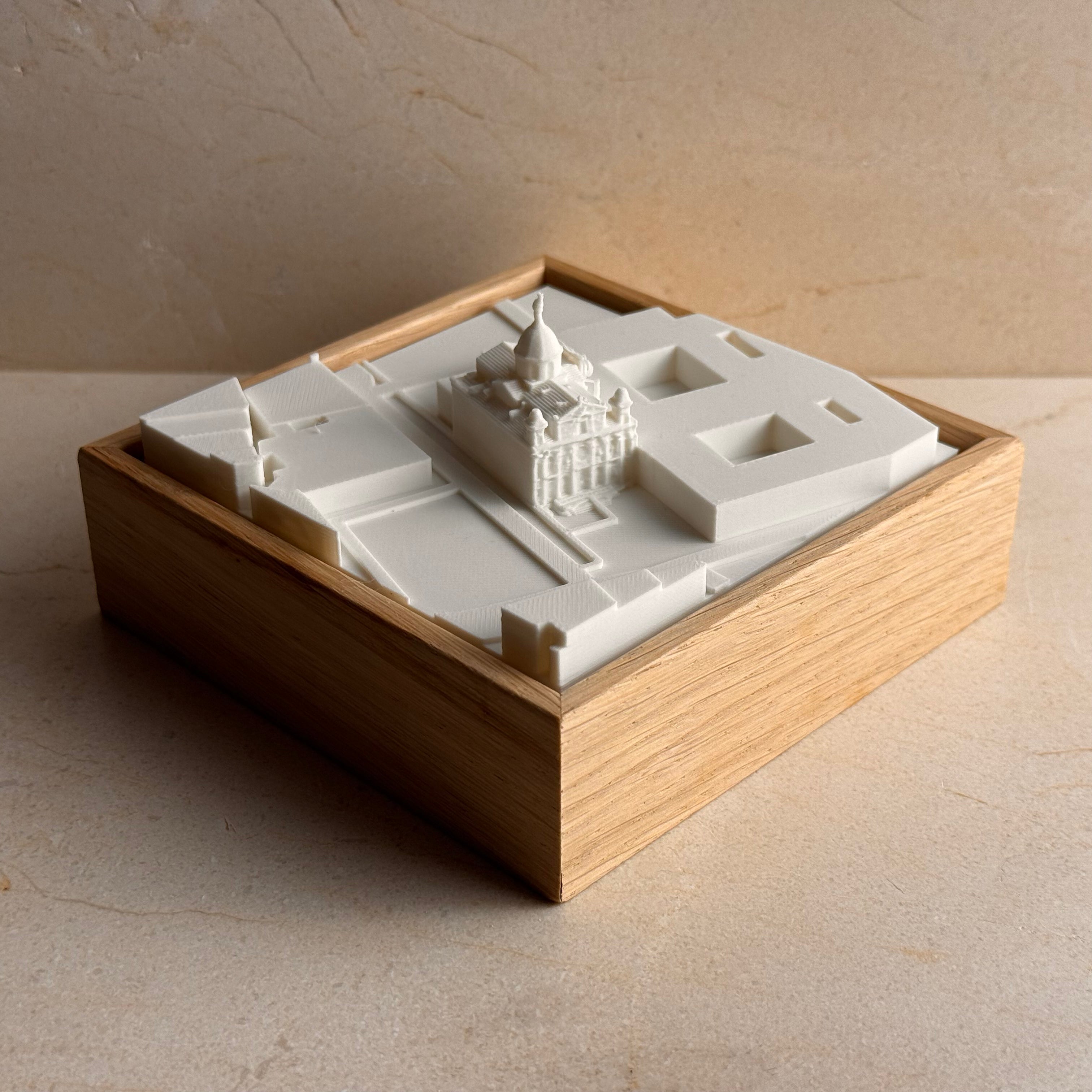 3D printed model of Santa Barbara church and surroundings in a wooden frame