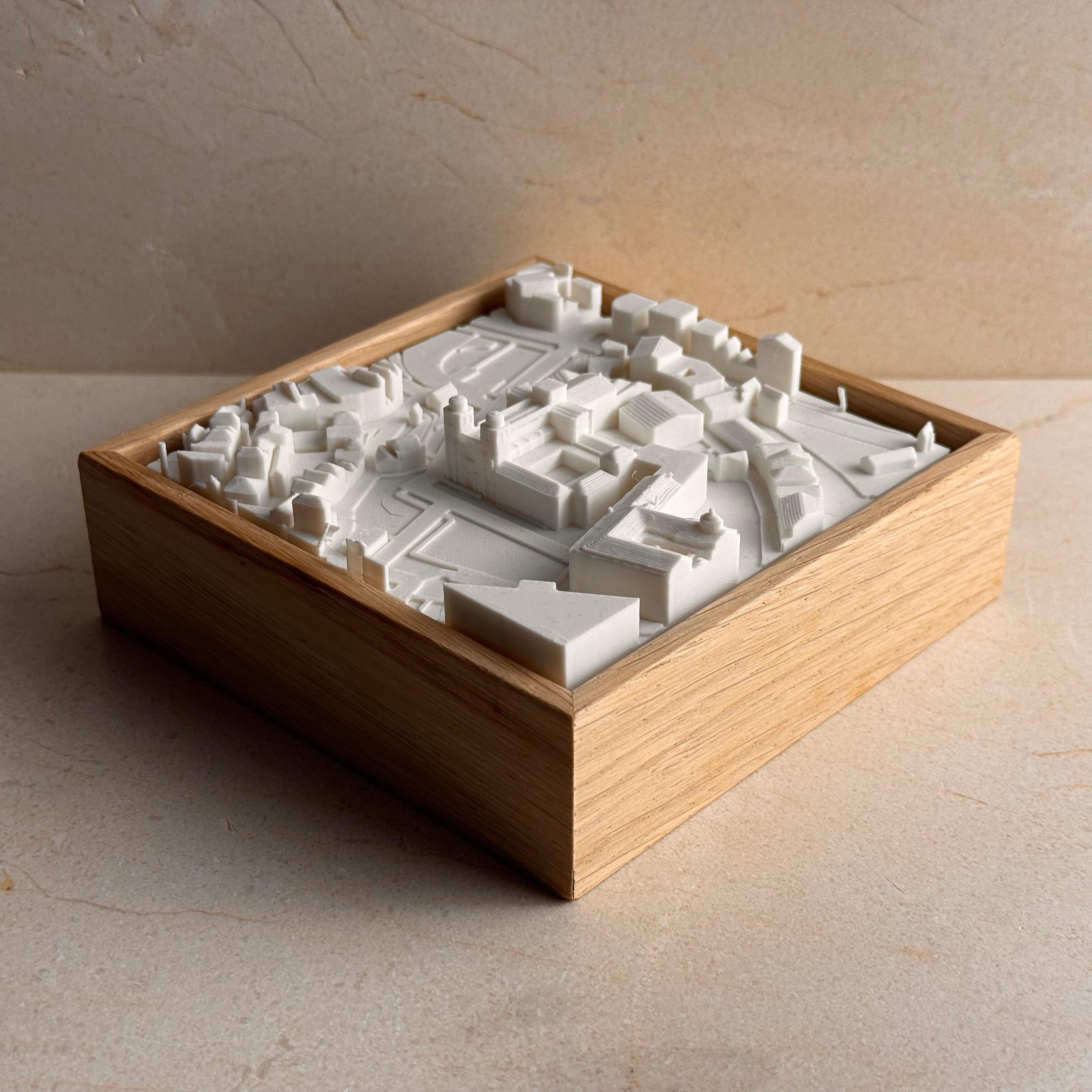 3D city map art in a wooden frame, white miniature buildings, modern home decor